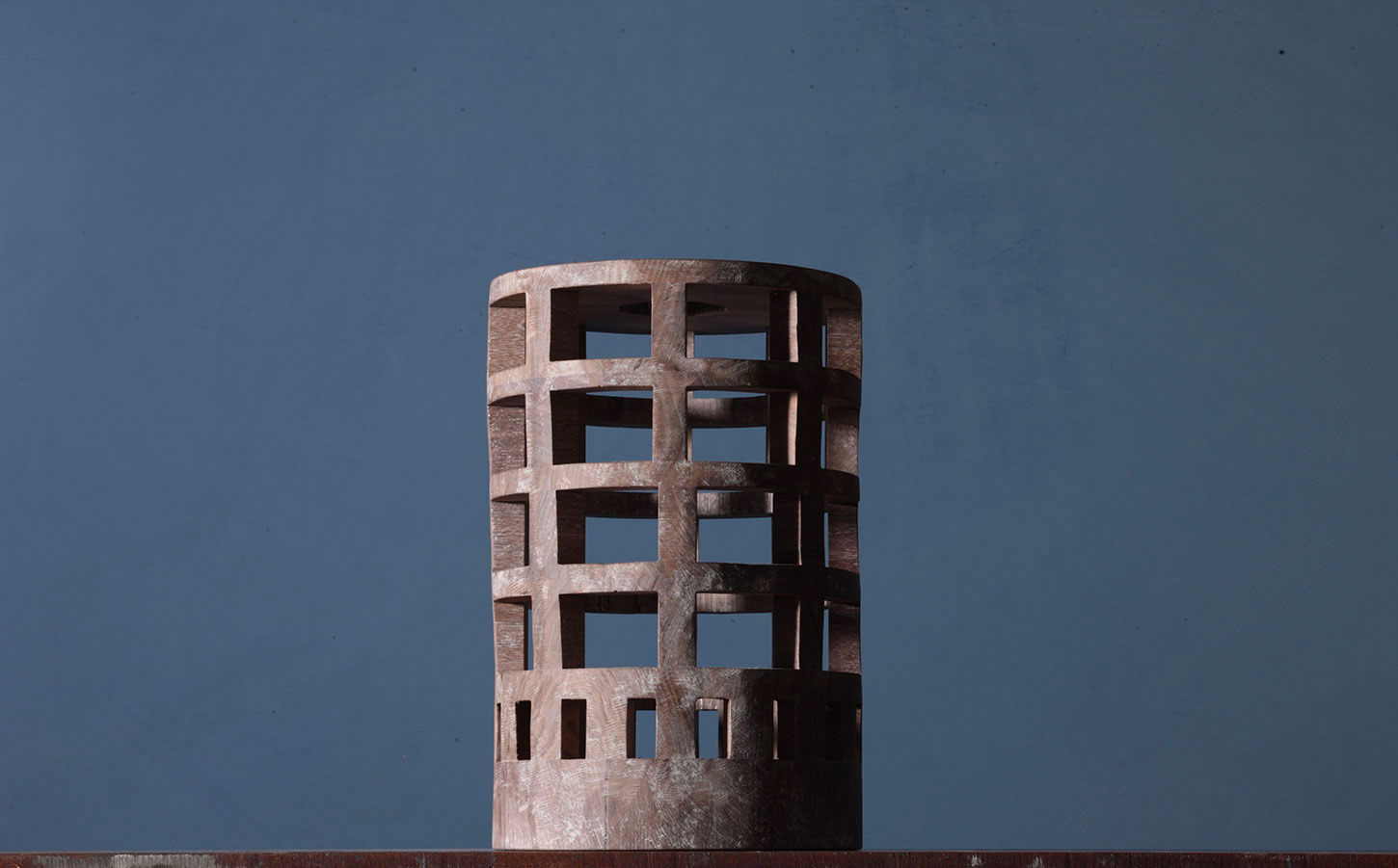 Edificio vuoto 323, a walnut sculpture of an empty building made in 2013. Image: Michele De Lucchi